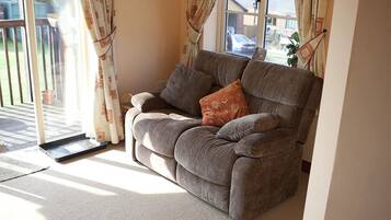 Departamento, 1 habitación (Hayloft) | Sala de estar | Televisión de pantalla plana