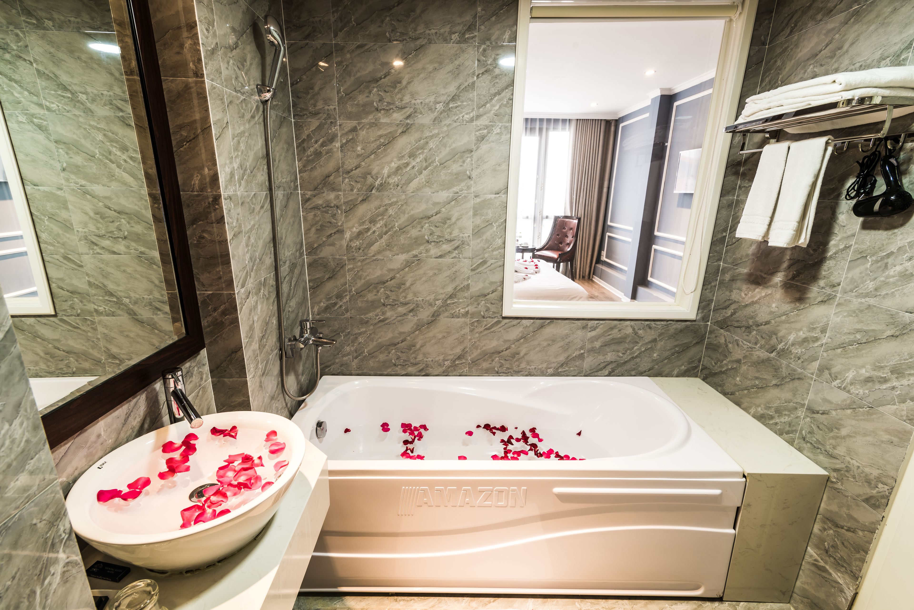 family triple room, balcony, city view | bathroom | shower, rainfall showerhead, hair dryer, slippers