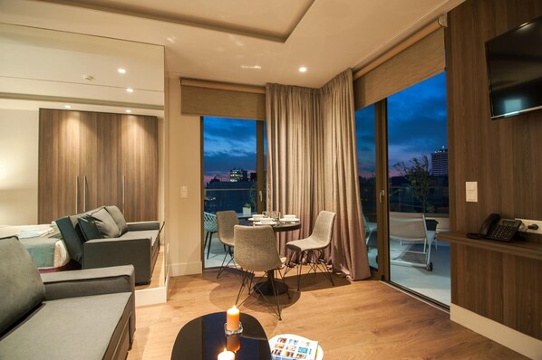 Executive Studio Suite | Living room | 35-inch LCD TV with cable channels, TV - Athens Platinum Rooms and Suites (Athens)