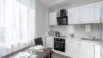 Apartment | Eigene Küche | Kühlschrank, Mikrowelle, Ofen, Herdplatte