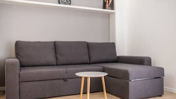 Apartment, 2 Bedrooms | Living area | 42-inch flat-screen TV with cable channels, TV