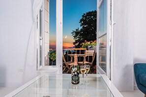 Enjoy a romantic dinner for two with a stunning view of the surrounding landscape.