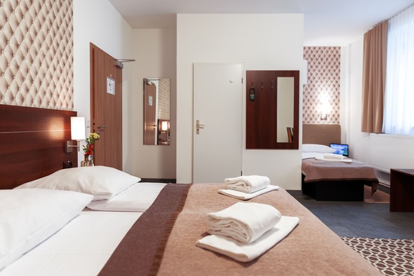 Basic Triple Room | Desk, blackout drapes, free WiFi, bed sheets