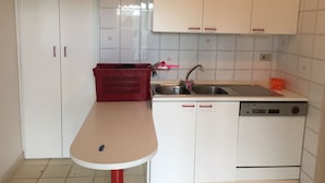 Apartemen, 2 kamar tidur | Dapur pribadi | Kompor, ketel listrik, dan peralatan masak/sendok-piring