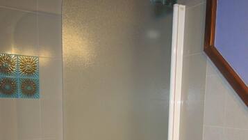 Deep soaking tub, rainfall showerhead, free toiletries, towels