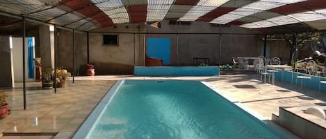 Indoor pool, sun loungers