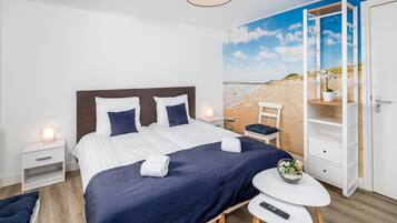 Comfort tweepersoonskamer | Verduisterende gordijnen, geluiddichte muren, extra bedden, gratis wifi