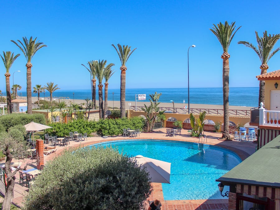 Seasonal outdoor pool, pool umbrellas, pool loungers