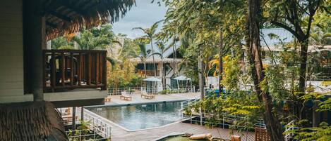 Outdoor pool, open 8:00 AM to 11:00 PM, sun loungers