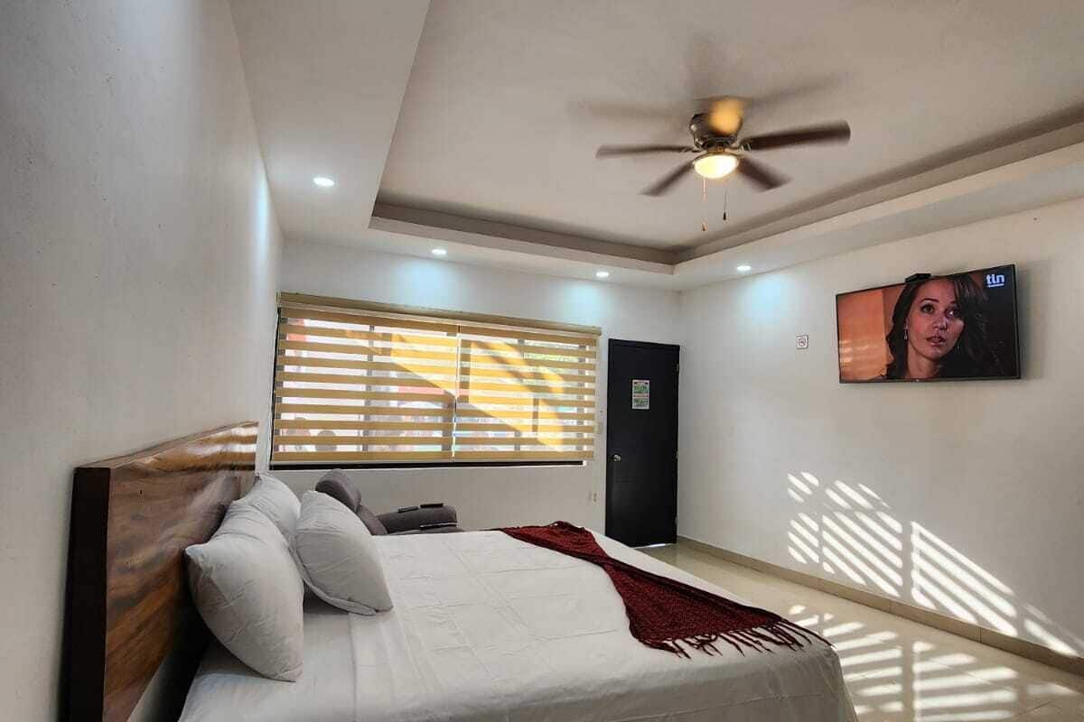 family double room, 2 double beds, accessible, pool view | 12 bedrooms, in-room safe, individually decorated