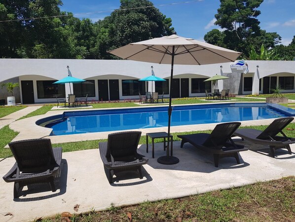 7 outdoor pools, open 9:00 AM to 11:00 PM, pool umbrellas