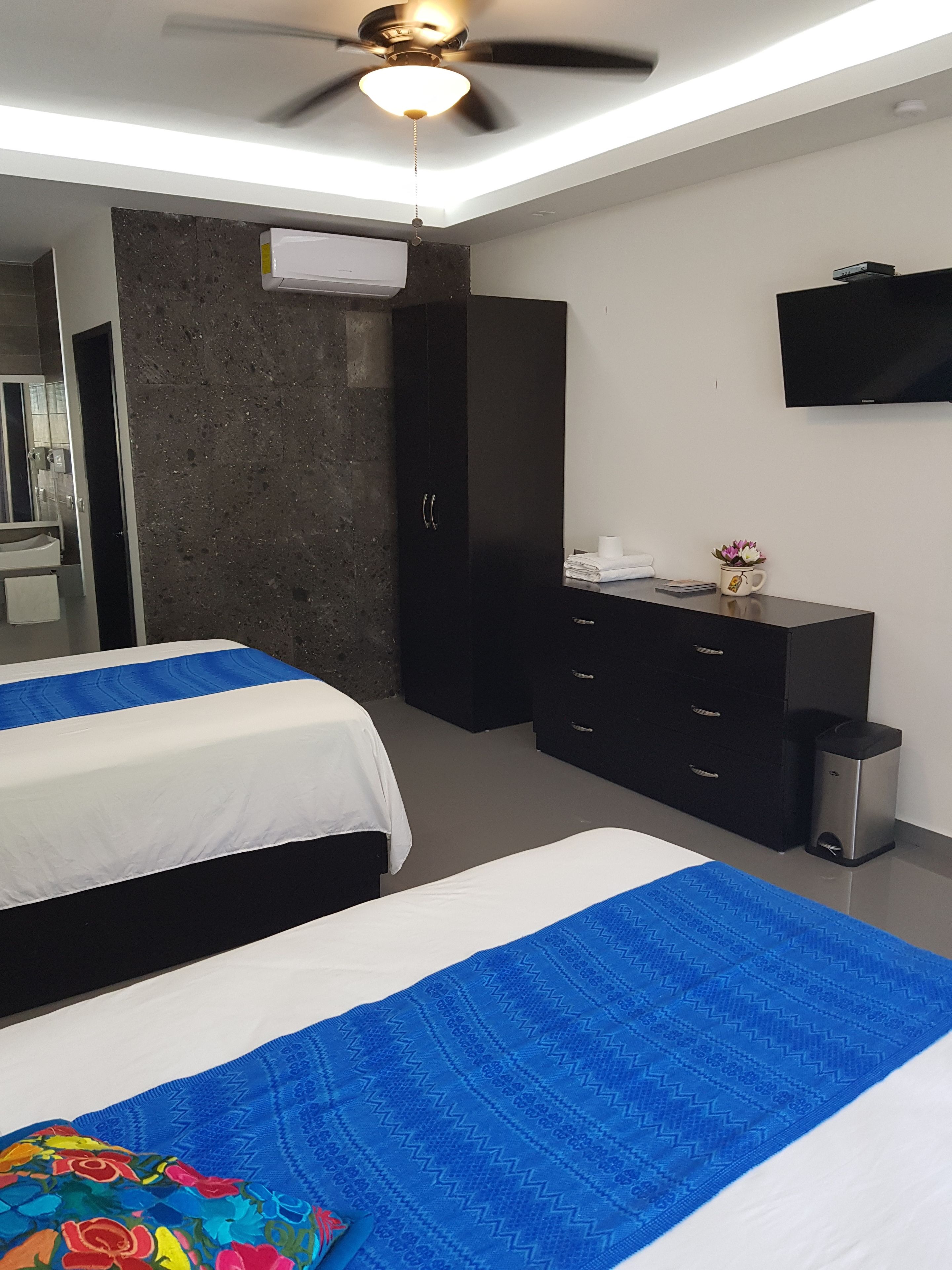 family double room, 2 double beds, accessible, pool view | 12 bedrooms, in-room safe, individually decorated