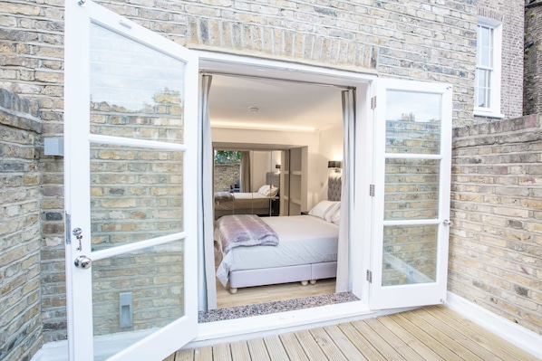 Luxe appartement, 2 tweepersoonsbedden, niet-roken, uitzicht op tuin | 2 slaapkamers, individueel gedecoreerd, individueel gemeubileerd