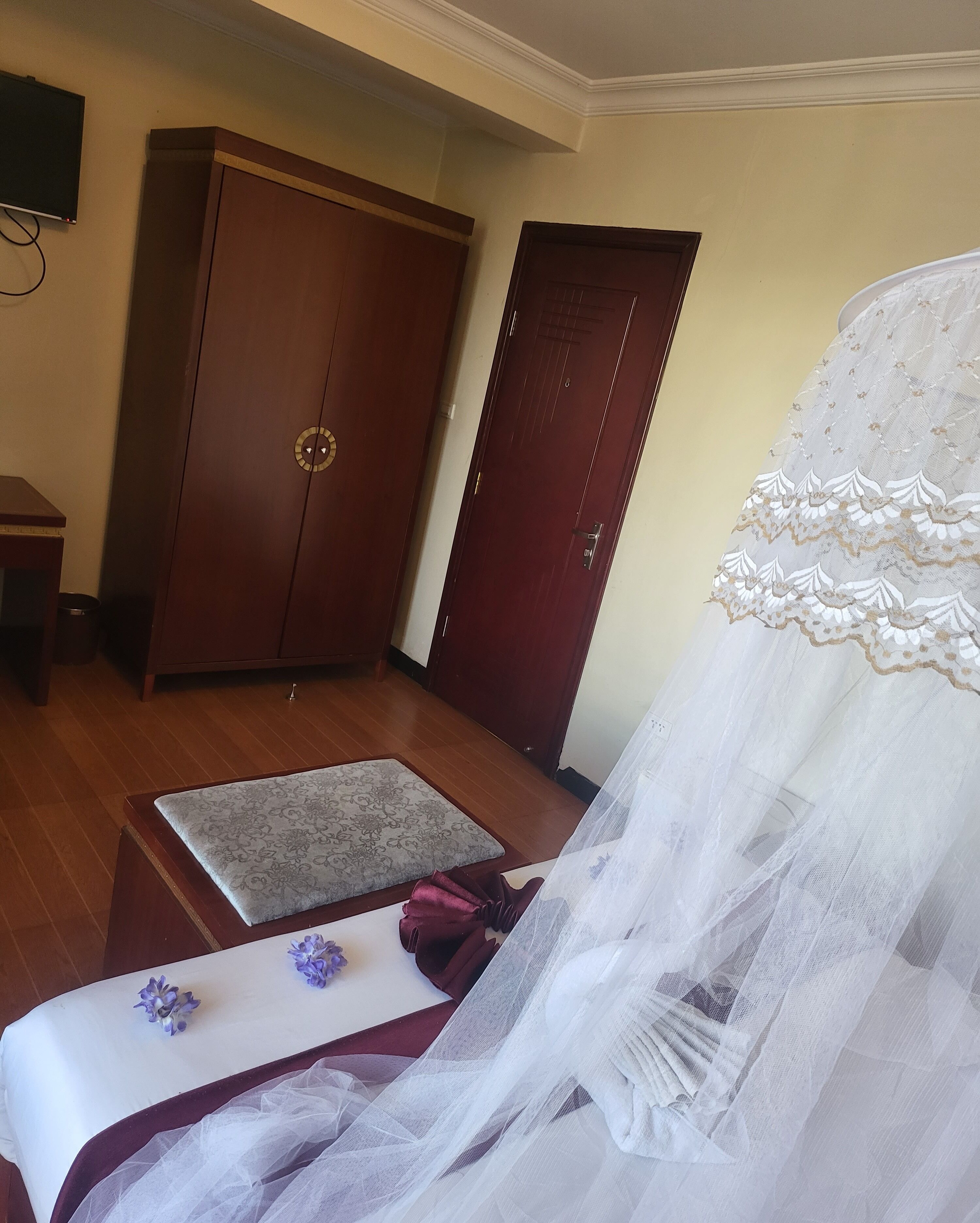 desk, laptop workspace, blackout curtains, travel cot