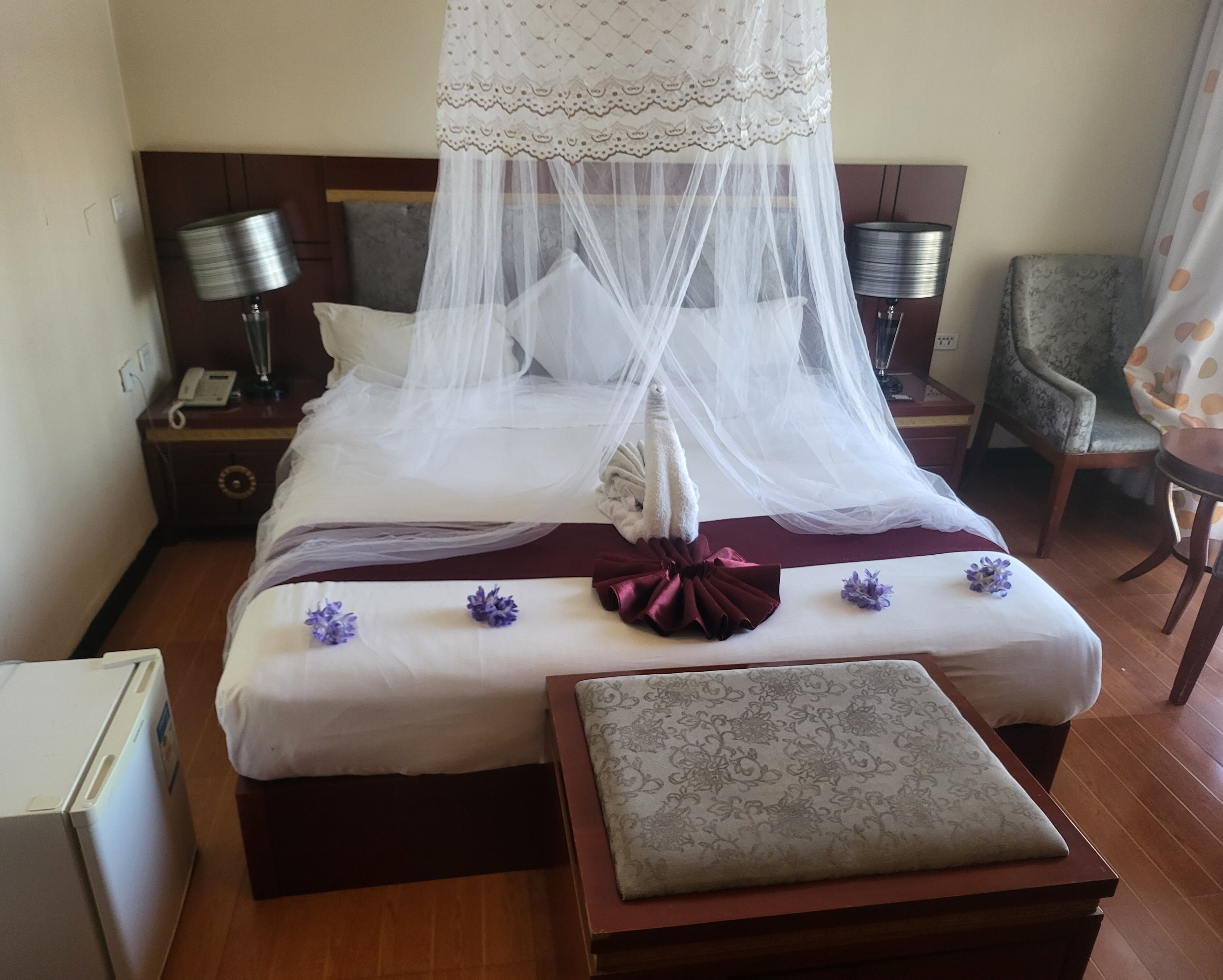 desk, laptop workspace, blackout curtains, travel cot