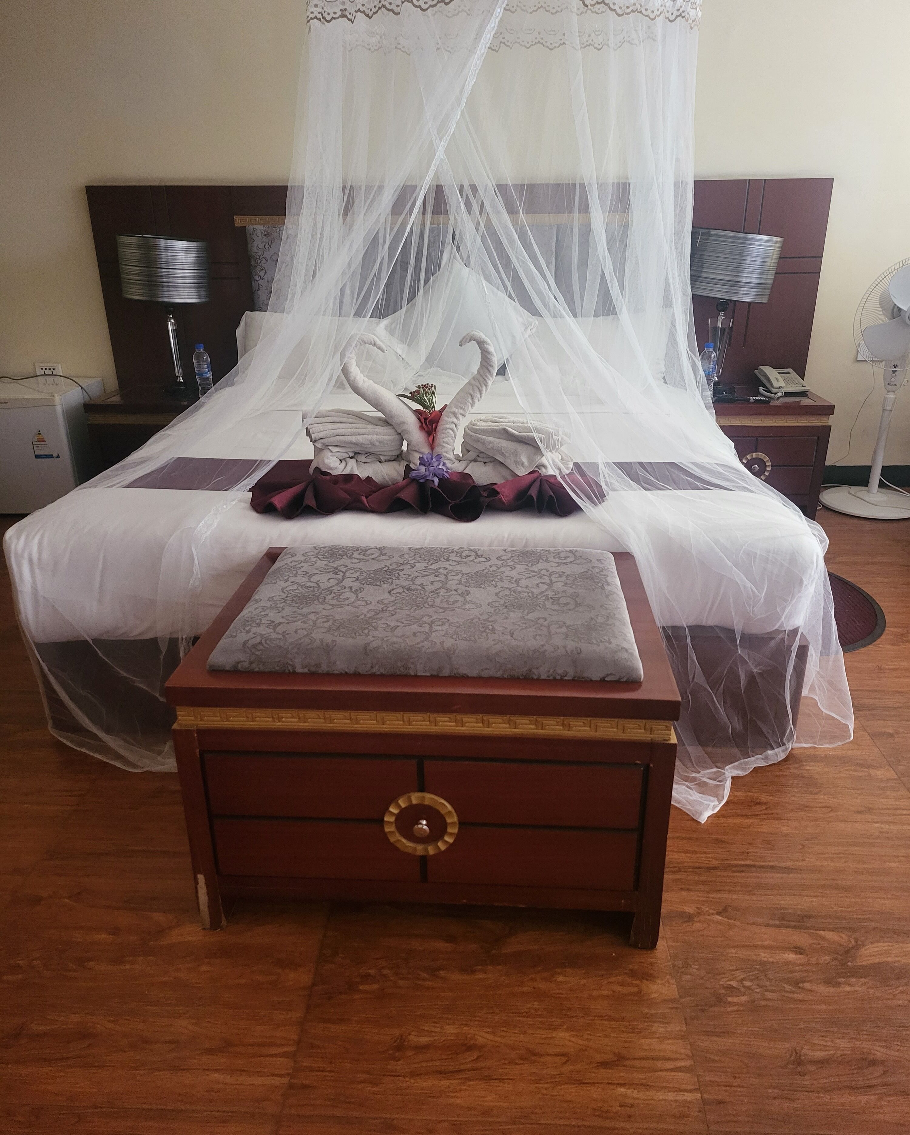 desk, laptop workspace, blackout curtains, travel cot