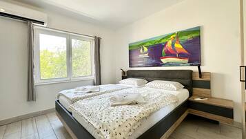 2 slaapkamers, een kluis op de kamer, een strijkplank/strijkijzer