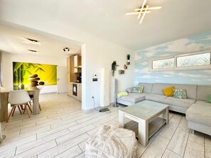 Smart TV, DVD player, ping pong, music library
