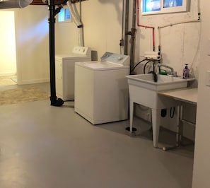 Hair dryer, towels, soap, shampoo