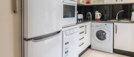 Microwave, oven, coffee/tea maker, spices