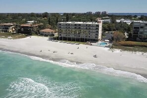 On the beach, sun-loungers, beach umbrellas, beach towels - Beachcomber unit 303 (Longboat Key)