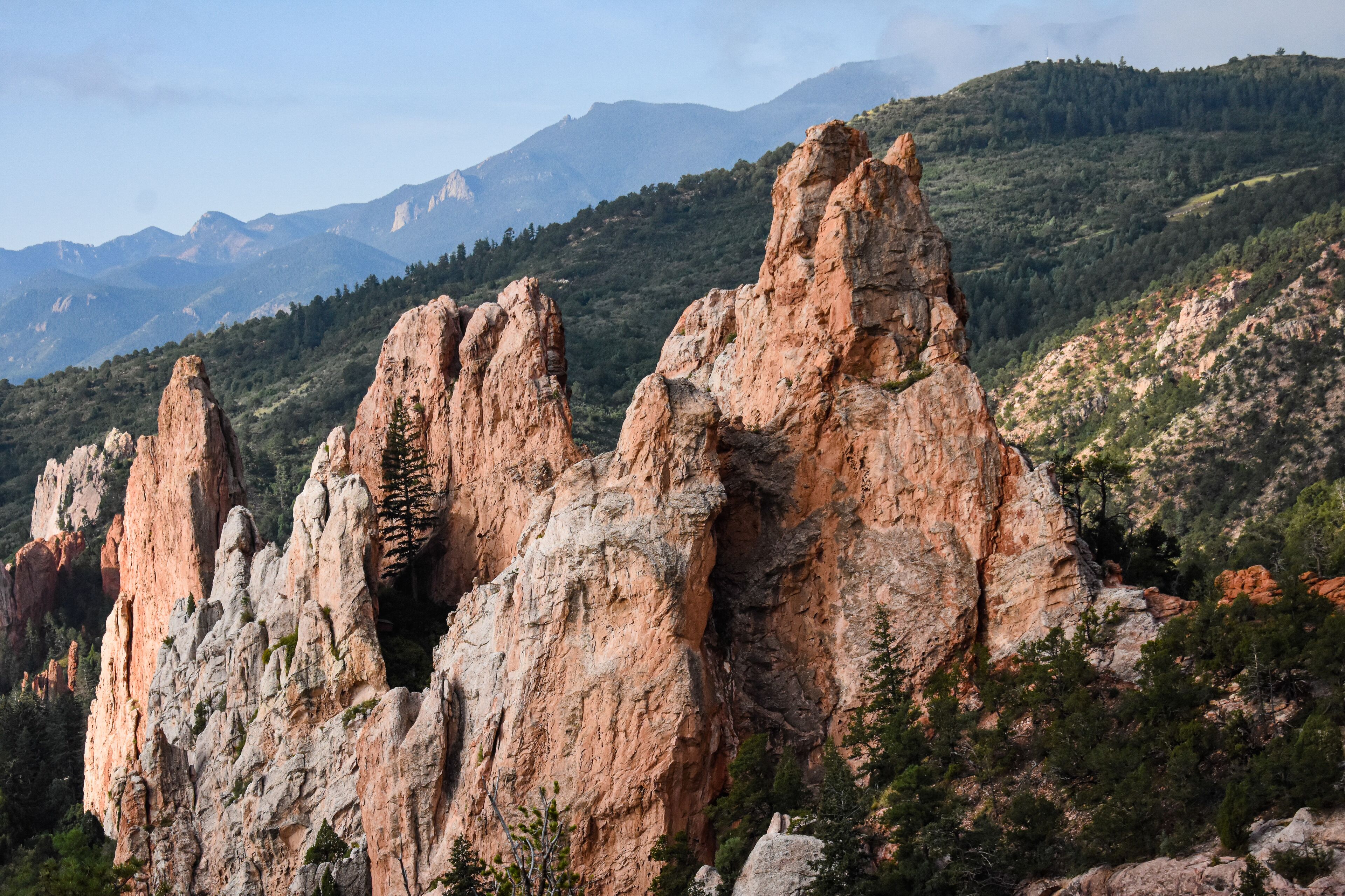 A rugged mountain landscape with prominent rock formations.