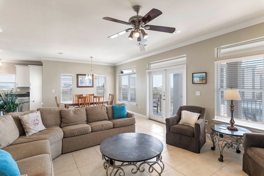 Third Floor: Living Room #3– Open-concept living room, bright and comfortable with plenty of seating.