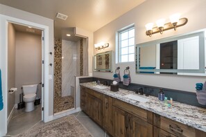 Combined shower/bathtub, hair dryer, towels, soap