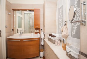 Eco-friendly toiletries, hair dryer, towels, soap