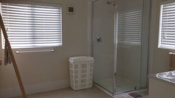 Shower, hair dryer, towels, soap