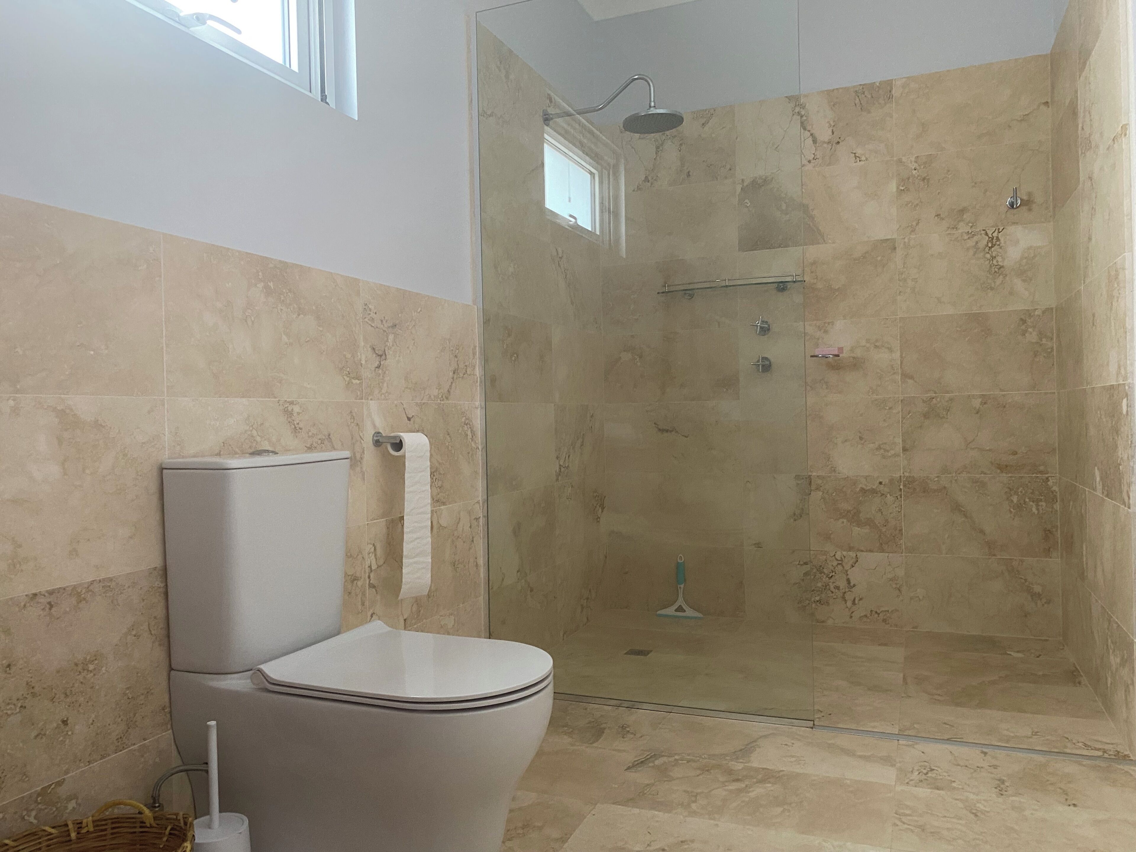 Shower, towels, soap, toilet paper