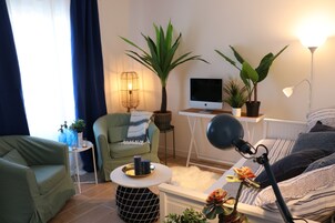 Apartamento luxo, para nĂŁo fumantes (4 people) | Sala de estar | TV de tela plana
