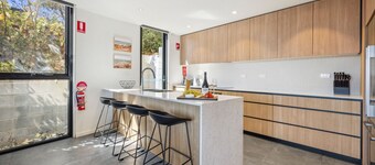 Chilam C embraces open plan living with a combined kitchen/ dining/ living area