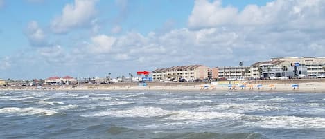 On the beach, sun-loungers, beach towels