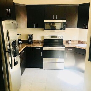 Coffee/tea maker, cookware/dishes/utensils, dining tables - BEAUTIFUL CONDO IN ROSARITO (VILLA SERENA) (Predios Urbanos)