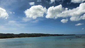 A coastal landscape with clear skies and a calm sea. - Mock Turtle is an Enchanting & Affordable Retreat! (Black Rock)