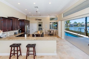 Fridge, microwave, oven, stovetop - Southern Comfort - Luxury Vacation Home (Cape Coral)