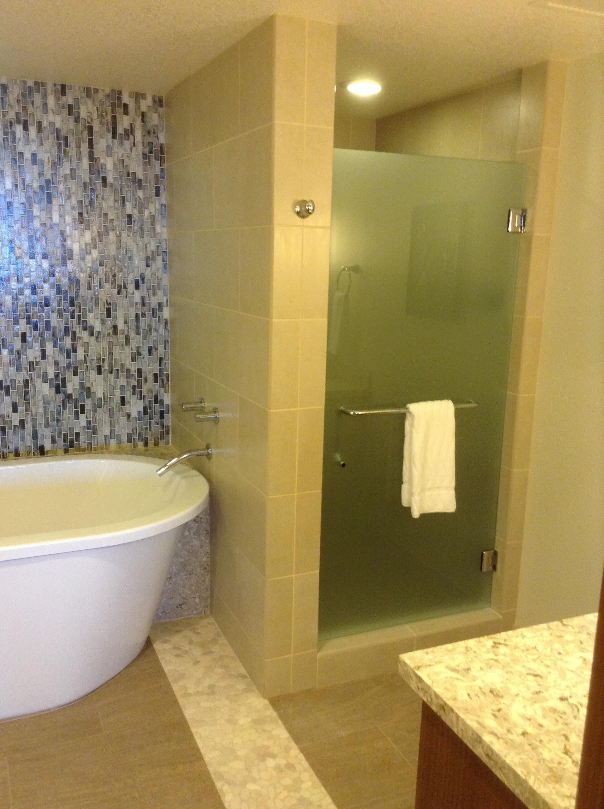 Combined shower/tub, hair dryer, towels, soap