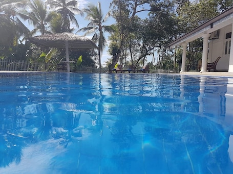 Outdoor pool. Tara Garden Tropical Villa with Private Pool & Friendly Staff Near Beach