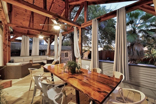 Outdoor dining table on back porch
