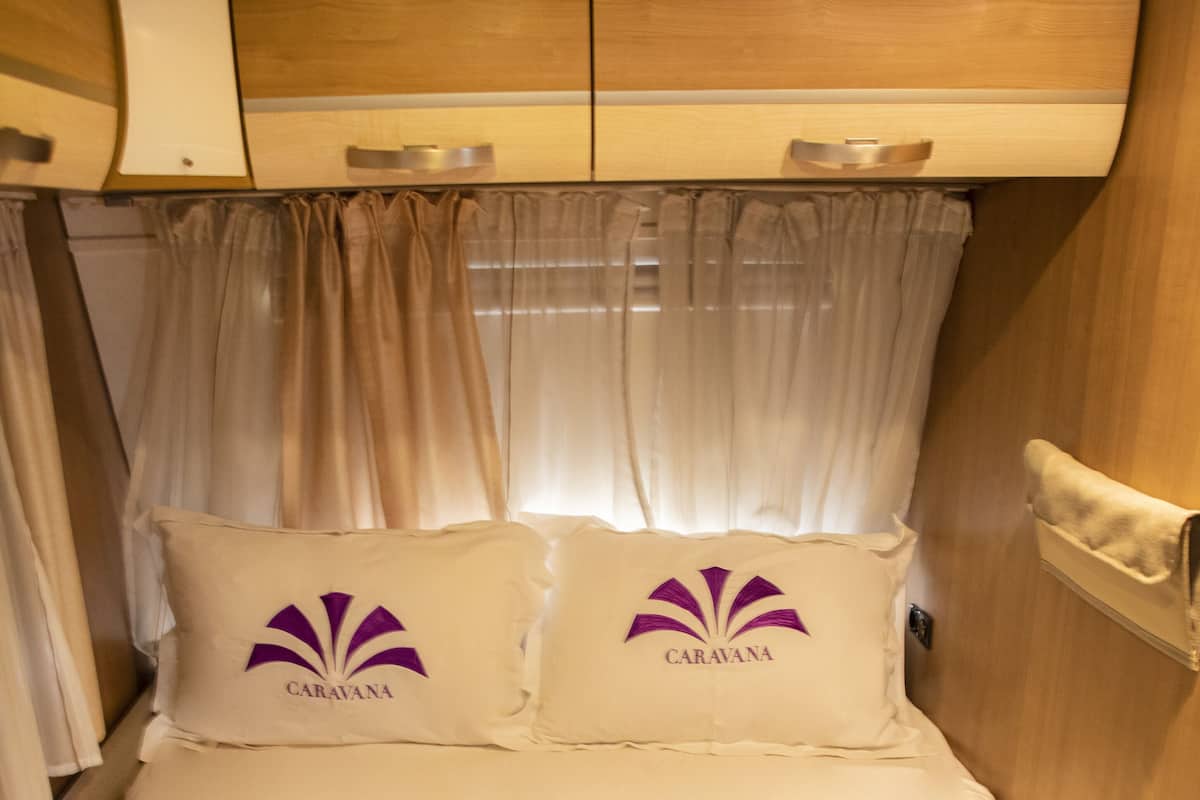 Standard Suite beachfront Caravana | Egyptian cotton sheets, hypo-allergenic bedding, down comforters