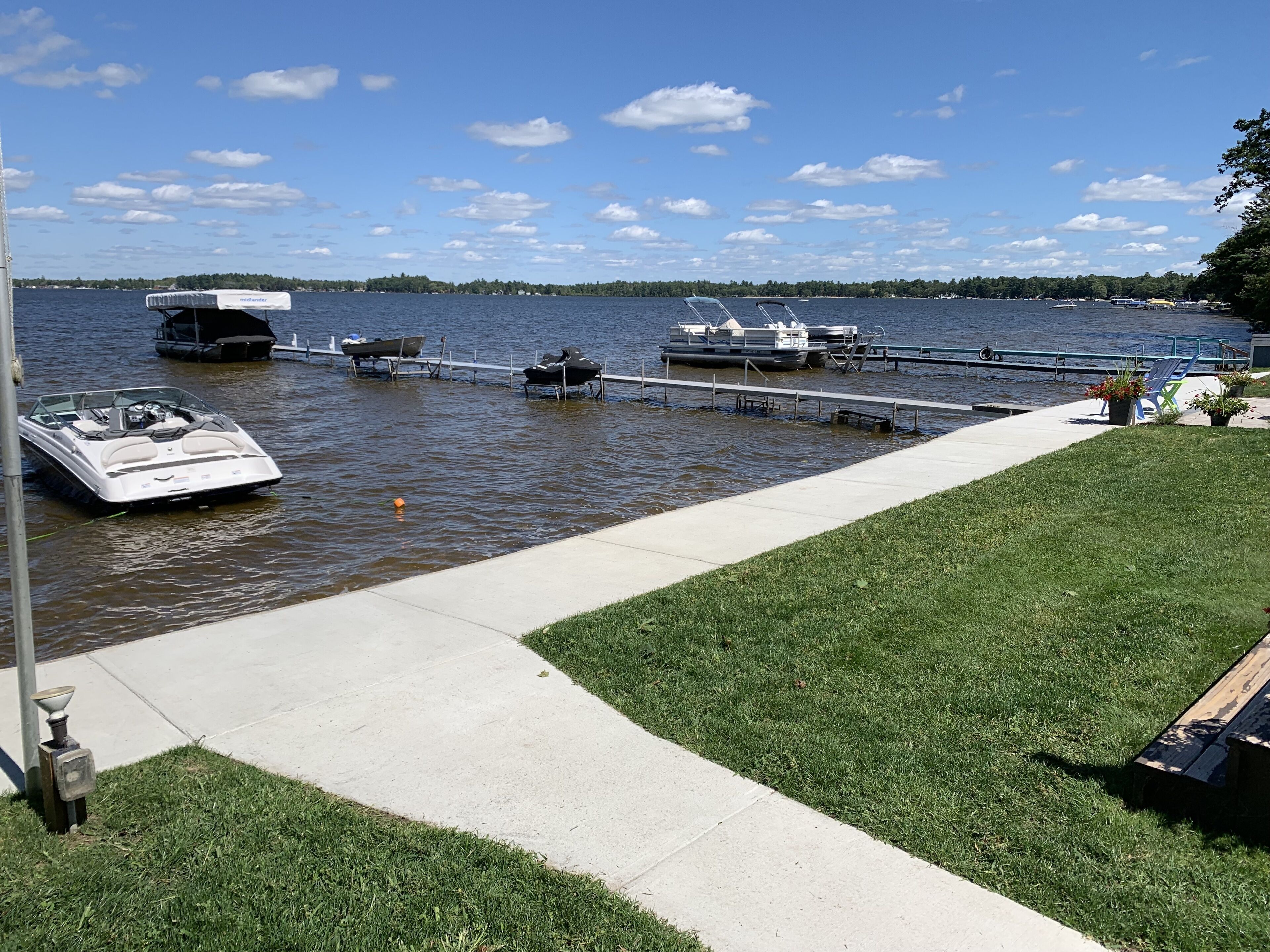 Summer fun, waterskiing, fishing or just relaxing just steps from Lake Mitchell!