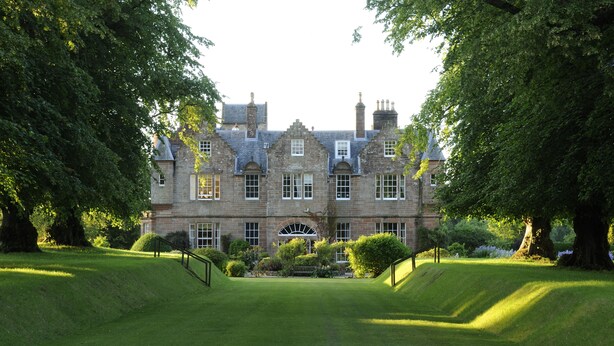 A large, historic stone building with a symmetrical facade, large windows, and a central entrance. - Historic 2000 Acre Country Estate in Rural Ayrshire, near Troon and Prestwick. (Hurlford)