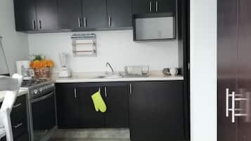 Fridge, microwave, stovetop, coffee/tea maker