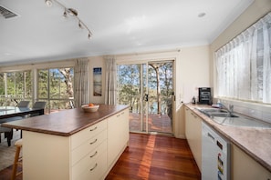 Kitchen and breakfast bar with a view