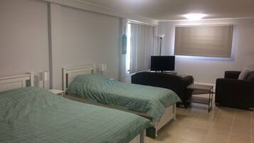 1 bedroom, desk, iron/ironing board, travel cot