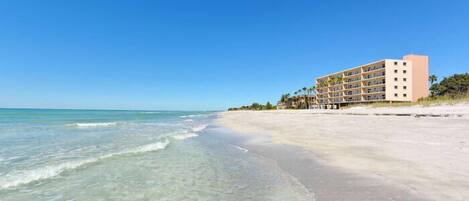 On the beach, sun loungers, beach towels