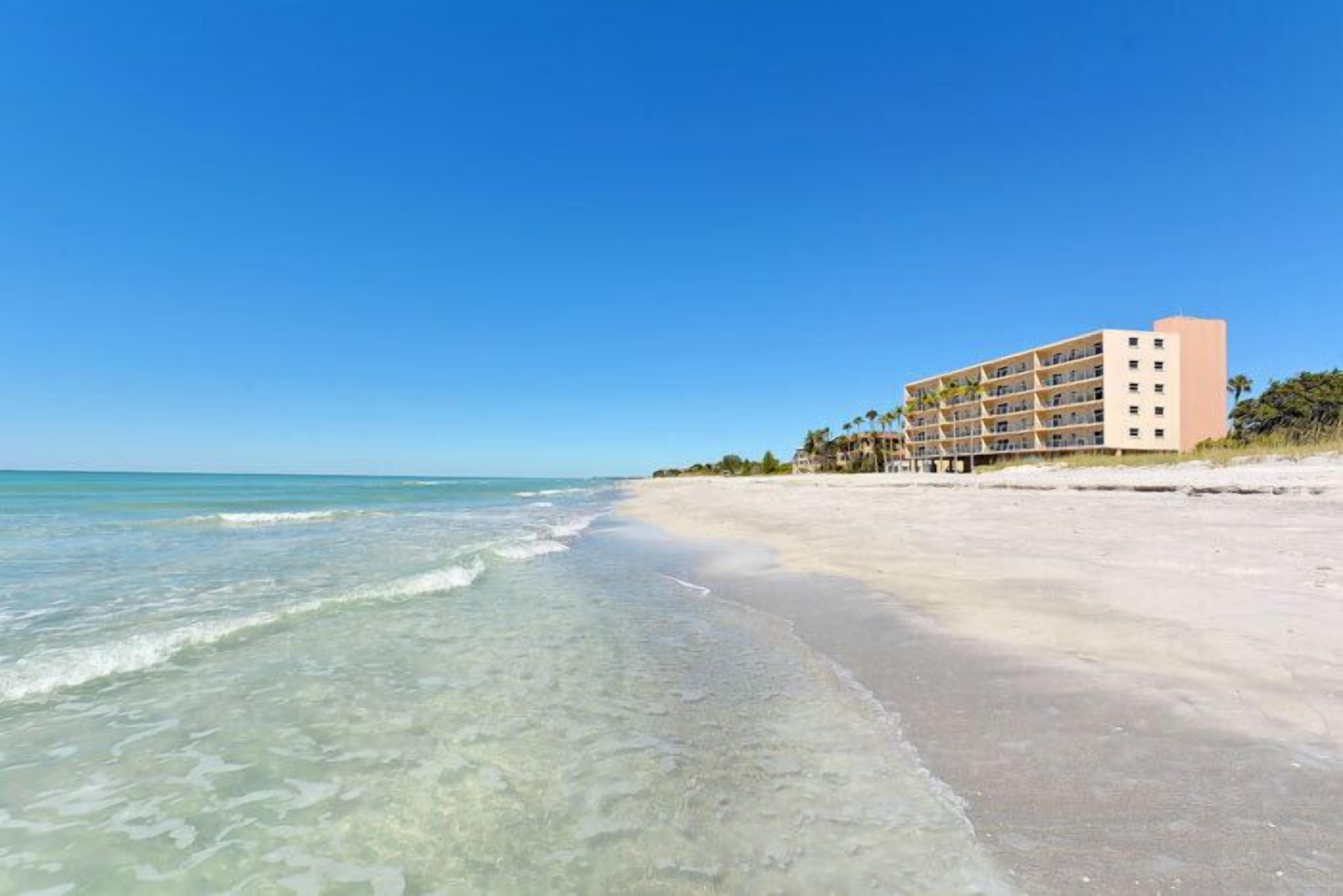 On the beach, sun loungers, beach towels