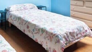 A bedroom with two beds, a dresser, and a nightstand. - VV Leo - country house in Andrín (Llanes) | 9–11 guests (Andrin)