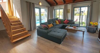 Holiday home with heated and kids pool